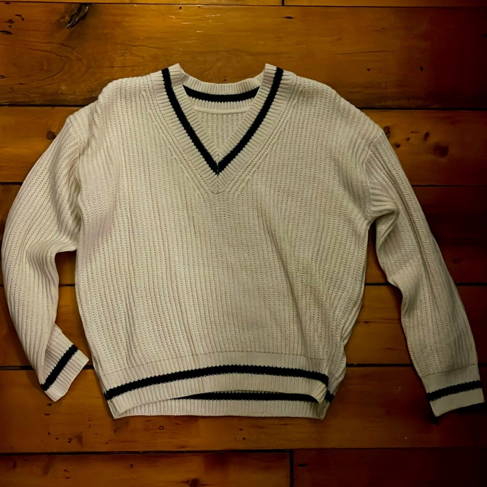 V-neck sweater; Cream colored with navy blue stripes